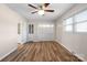 Bedroom with ceiling fan and built-in closet at 760 Bethesda Rd, Statesville, NC 28677