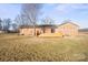 Brick house back view, with deck and yard at 760 Bethesda Rd, Statesville, NC 28677