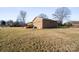 Brick ranch house with side deck and yard at 760 Bethesda Rd, Statesville, NC 28677