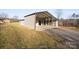 Metal workshop with covered storage area at 760 Bethesda Rd, Statesville, NC 28677