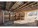 Interior of workshop with wooden shelving and beams at 760 Bethesda Rd, Statesville, NC 28677
