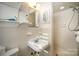Clean bathroom with single vanity and shower at 7740 Robinson Church Rd, Charlotte, NC 28215