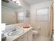 Clean bathroom with a vanity, shower, and updated fixtures at 7740 Robinson Church Rd, Charlotte, NC 28215