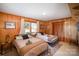 Guest bedroom with two twin beds and wood paneled walls at 7740 Robinson Church Rd, Charlotte, NC 28215