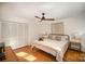 Bright bedroom with king-size bed and built-in closet at 7740 Robinson Church Rd, Charlotte, NC 28215