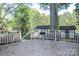 Outdoor deck area for grilling or entertaining at 7740 Robinson Church Rd, Charlotte, NC 28215