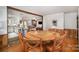 Dining area with round table and chairs, open to kitchen at 7740 Robinson Church Rd, Charlotte, NC 28215