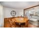 Dining room with round table and view of kitchen and living room at 7740 Robinson Church Rd, Charlotte, NC 28215