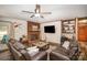 Living room with fireplace, built-ins and comfortable seating at 7740 Robinson Church Rd, Charlotte, NC 28215