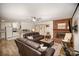 Spacious living room with a brick fireplace and open floor plan at 7740 Robinson Church Rd, Charlotte, NC 28215