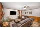 Living room with a fireplace and built-in shelving at 7740 Robinson Church Rd, Charlotte, NC 28215