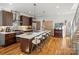 Modern kitchen with island, stainless steel appliances, and hardwood floors at 914 Greenleaf Ave # B, Charlotte, NC 28202