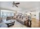 Inviting living room with hardwood floors and seamless flow to the kitchen and dining areas at 1007 Orchid Ln, Fort Mill, SC 29707