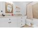 Bright bathroom featuring white cabinetry and a shower-tub combination at 107 E Cold Hollow Farms Dr, Mooresville, NC 28117