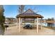 Community gazebo offers seating with a peaceful lake view, and a grilling area at 117 Tomahawk Dr, Mooresville, NC 28117