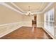 Dining room with hardwood floors and chandelier at 1227 Mountain Laurel Ct, Matthews, NC 28104