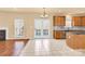 Kitchen with island, stainless steel appliances, and access to deck at 1227 Mountain Laurel Ct, Matthews, NC 28104