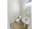 Small bathroom with pedestal sink and toilet at 133 Jacobs Woods Cir, Troutman, NC 28166