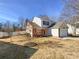 Front view of two-story house with attached garage at 133 Jacobs Woods Cir, Troutman, NC 28166