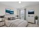 Bright bedroom with a queen-size bed and natural light at 13443 Norseman Ln, Huntersville, NC 28078