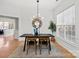 Dining area with modern table, chairs, and a chandelier at 13443 Norseman Ln, Huntersville, NC 28078