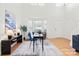 Bright living room with hardwood floors, high ceilings and large windows at 13443 Norseman Ln, Huntersville, NC 28078