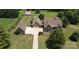 Aerial view of a house, detached garage, and large backyard at 1519 Triplett Rd, Cleveland, NC 27013