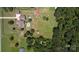 An aerial view showing a house, pool, and expansive grounds at 1519 Triplett Rd, Cleveland, NC 27013