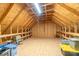 Unfinished attic space with wood framing and flooring at 1519 Triplett Rd, Cleveland, NC 27013