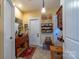 Quaint bathroom includes a vanity, shelving, and a basket for laundry at 1519 Triplett Rd, Cleveland, NC 27013