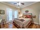 Spacious bedroom with hardwood floors and access to a patio at 1519 Triplett Rd, Cleveland, NC 27013