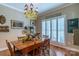 Farmhouse-style dining room with antique table and chairs at 1519 Triplett Rd, Cleveland, NC 27013