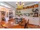 Rustic farmhouse dining area with built in shelving at 1519 Triplett Rd, Cleveland, NC 27013