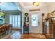 Inviting entryway with hardwood floors and white door at 1519 Triplett Rd, Cleveland, NC 27013