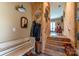 Entryway with built-in bench, coat rack, and stairs at 1519 Triplett Rd, Cleveland, NC 27013