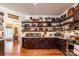 Spacious kitchen with ample shelving and wood cabinets at 1519 Triplett Rd, Cleveland, NC 27013