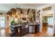 Island kitchen with stainless steel appliances and farmhouse sink at 1519 Triplett Rd, Cleveland, NC 27013