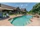 Freeform swimming pool with surrounding patio at 1519 Triplett Rd, Cleveland, NC 27013