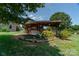 Charming rustic shed with stone pathway, landscaping, and bridge at 1519 Triplett Rd, Cleveland, NC 27013