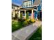 Welcoming front porch and walkway leading to a charming blue house at 1575 Riverwalk Pkwy, Rock Hill, SC 29730