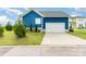 Detached two-car garage with ample parking space and green landscaping at 1575 Riverwalk Pkwy, Rock Hill, SC 29730