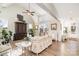 Bright living room featuring vaulted ceilings, hardwood floors, and sophisticated furnishings and decor at 1575 Riverwalk Pkwy, Rock Hill, SC 29730