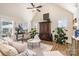 Spacious living room with vaulted ceiling, hardwood floors, and lots of natural light at 1575 Riverwalk Pkwy, Rock Hill, SC 29730