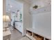Mudroom with a built-in bench, storage cubbies, and access to the kitchen at 1575 Riverwalk Pkwy, Rock Hill, SC 29730
