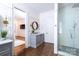 Spa-like bathroom with a walk-in shower, soaking tub, and modern vanity at 2002 Summey Ave # 3, Charlotte, NC 28205