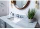 Vanity with marble countertop, modern sink, and stylish mirror at 2002 Summey Ave # 3, Charlotte, NC 28205