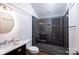 Bathroom with a large walk-in shower and dark tile at 2002 Summey Ave # 3, Charlotte, NC 28205