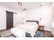 Main bedroom with a king-size bed and barn door to the bathroom at 2002 Summey Ave # 3, Charlotte, NC 28205