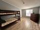 bedroom with bunk beds and ample floor space at 203 Shane Dr, Mount Holly, NC 28120