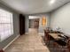 Dining room with dark wood table and chairs at 203 Shane Dr, Mount Holly, NC 28120